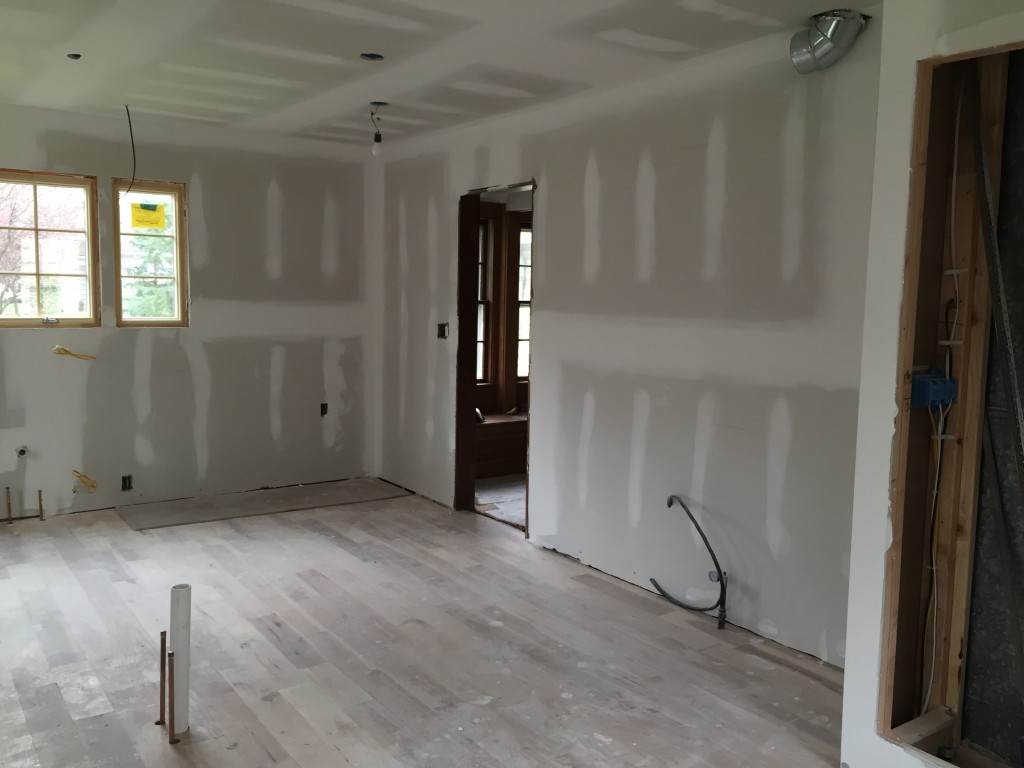 Fridge will be to the right of the windows.