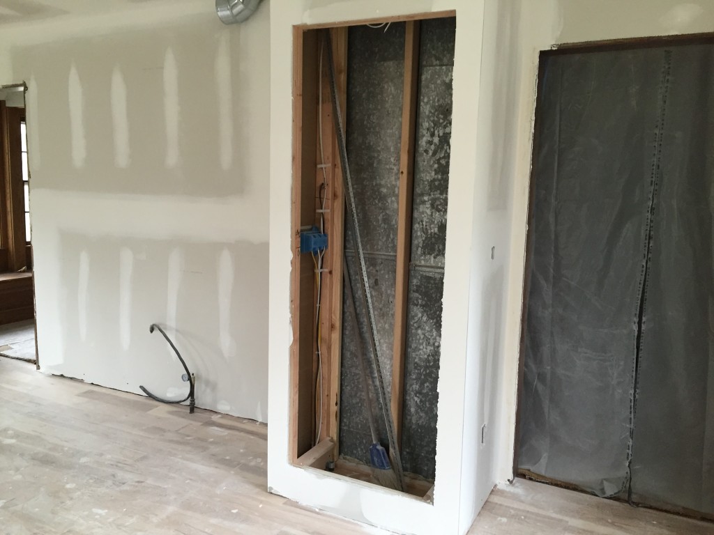 Bookshelf unit will slide in here, next to the stove & cabinets